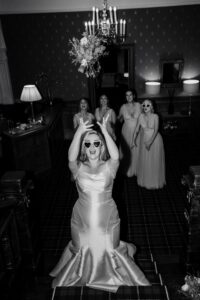 The bride throws her bouquet