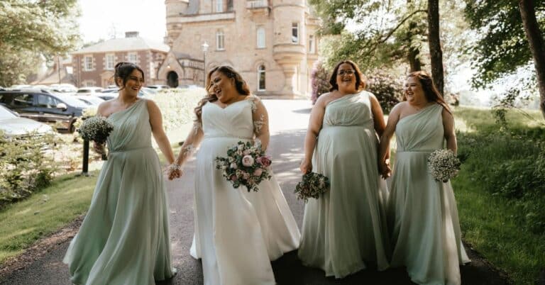 Plus Size Bride Sara Laughs with her Bridesmaids on her Wedding Day