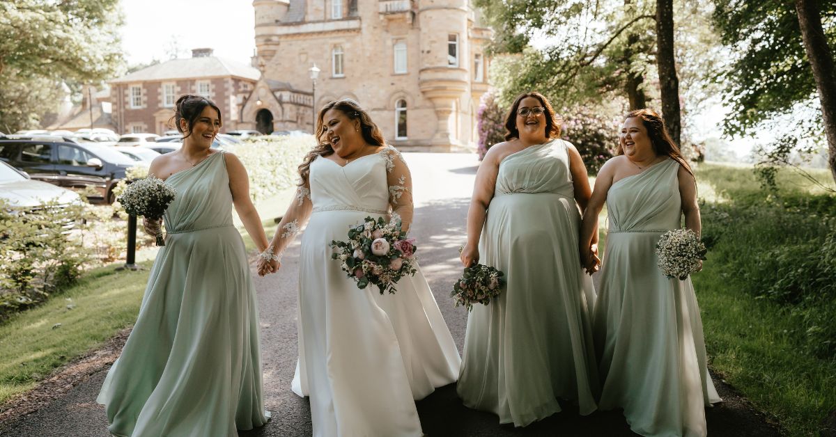 Plus Size Bride Sara Laughs with her Bridesmaids on her Wedding Day