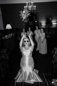 The bride throws her bouquet