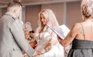 The bride and groom, Kelsey and Dylan say their wedding vows